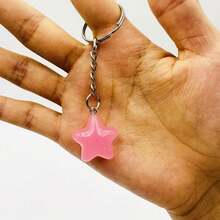 Llavero con estrellas que brillan en la oscuridad, adecuado para bolsos y mochilas, perfecto como recuerdo de fiesta y regalo de cumpleaños - Multicolor - Ver 14