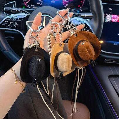 Accesorio de estilo occidental, colgante de sombrero de vaquero vintage versátil con diseño único de cuerda trenzada con borla y hebilla de corazón de moda, adecuado como regalo para amigos, parejas, colegas en varios festivales