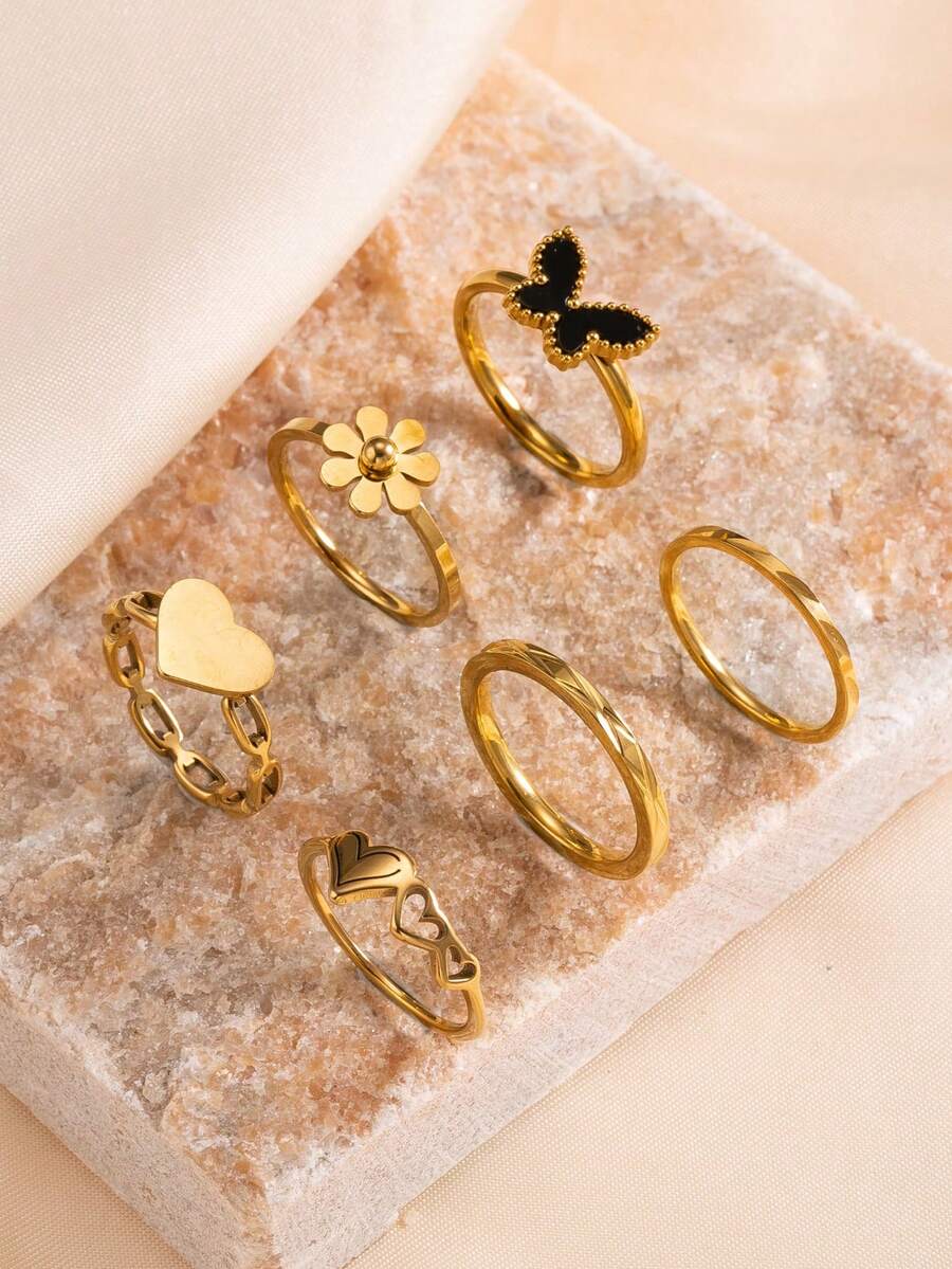 6件套不锈钢镀18K金女士戒指套装,包含花朵、黑色蝴蝶、心形元素,适合日常佩戴、约会、度假、夏季配饰。 - 金色 - 查看 1