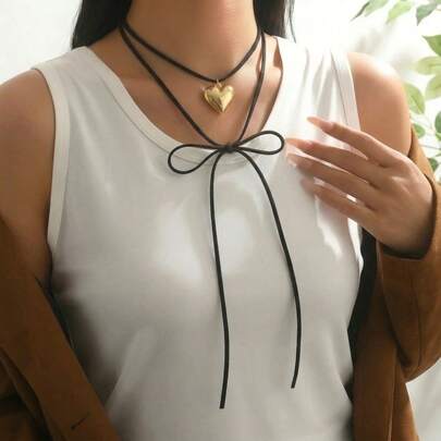 1 chiếc vòng cổ nhiều lớp kiểu cổ điển, có thể điều chỉnh, màu đen, hình trái tim và nơ, thích hợp để đeo hàng ngày, làm quà tặng, dự tiệc, đi nghỉ mát và các buổi tiệc chiêu đãi.