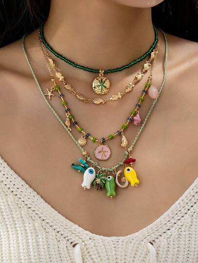 1 pieza Collar de playa bohemio de múltiples capas para mujer - Conjunto de collares con encantos de estrella de mar y pez de tema oceánico - Joyería de playa bohemia para vacaciones