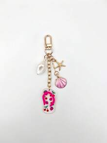 1个航海主题海星贝壳钥匙扣，细节精致，可爱女性配饰，适合海滩度假、日常佩戴，时尚潮流，深受年轻人喜爱。 - 彩色 - 查看 11