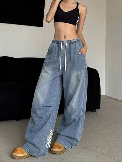 سراويل جينز نسائية بخصر منخفض ذات لون أحادي وطباعة حرفية، قصة مستقيمة فضفاضة مع رباط وخصر مطاطي للاستخدام اليومي