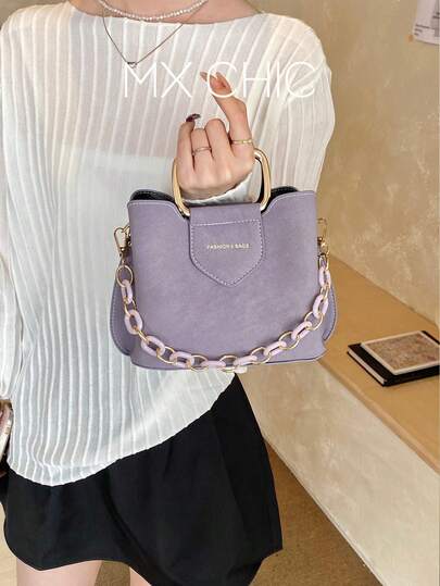 1个女士纯色PU水桶包，时尚复古风单肩斜挎包，适合通勤、购物和送礼。