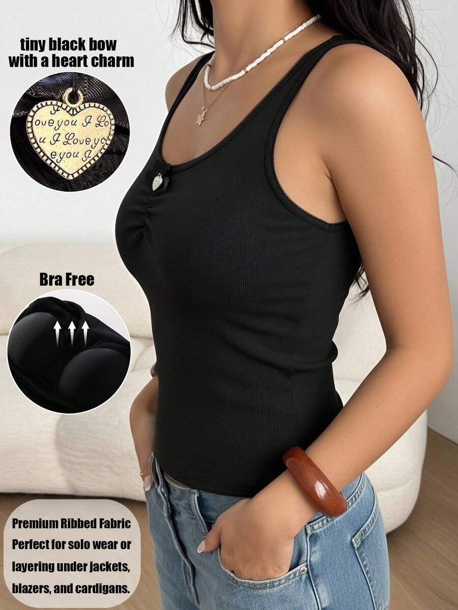 1 pezzo Canotta basic nera con fiocco e pendente a forma di cuore, senza maniche, con imbottitura sul busto, camisole corta in cotone elasticizzato, essenziale per tutte le stagioni - nero - Visualizzare 1