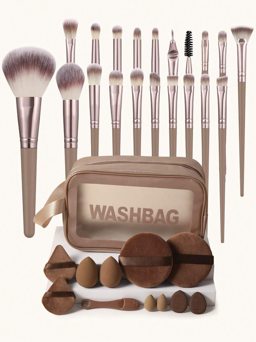 Bộ dụng cụ trang điểm 32 món bao gồm: Bộ 20 cọ trang điểm + 2 bông mút trang điểm + 2 bông phấn tam giác + 2 bông mút rửa mặt + 2 bông mút trang điểm mini + 2 bông phấn nền mini + 1 cọ rửa mũi + 1 túi đựng mỹ phẩm và đồ dùng cá nhân đa năng có khóa kéo chống thấm nước - màu nâu - Xem 1