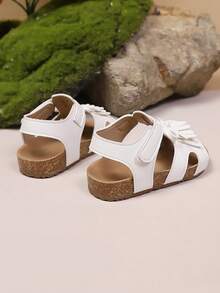 1 đôi dép xăng đan đế bằng mềm mại, kiểu dáng công chúa thời trang, có nơ và tua rua dành cho bé gái, thích hợp cho mùa hè. - trắng - Xem 5