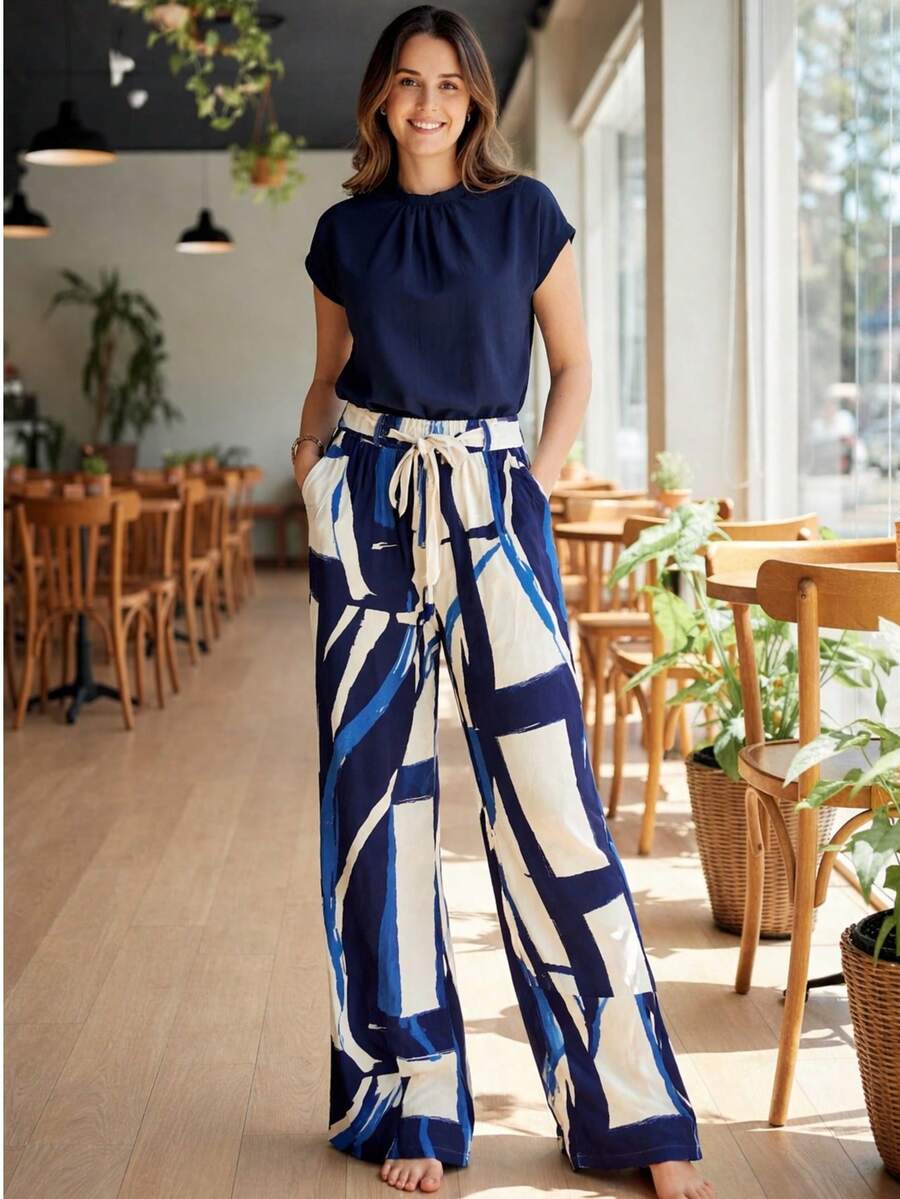 Printed Wide-Leg Pants In Viscose Linen, High Waist, With Pockets, Lining And Tie Detail. - Pantalones anchos con estampado geométrico azul - Ver 1