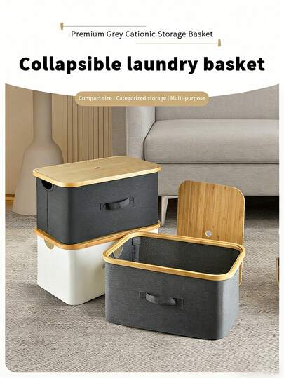 1 giỏ đựng quần áo bẩn có nắp đậy, làm bằng vải Oxford, có thể gấp gọn, dùng để đựng quần áo bẩn trong nhà.