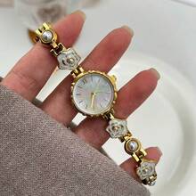 1. Đồng hồ nữ thanh lịch, sang trọng, mặt tròn, dây đeo hoa vàng, đính đá, mẫu mới 2026, máy quartz, thời trang tinh tế. - Vàng - Xem 4