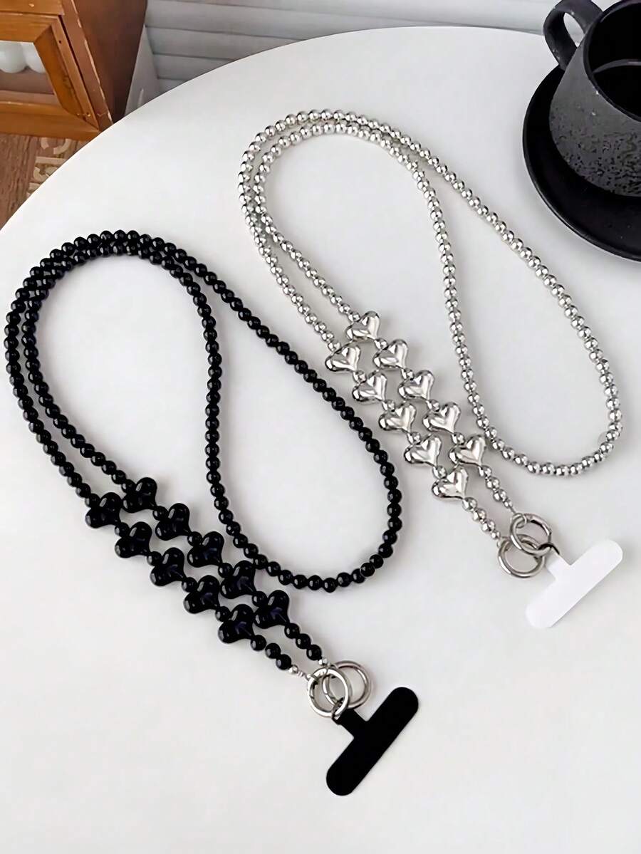 1 chiếc dây đeo điện thoại chéo vai thủ công kiểu tối giản, đính hạt cườm, hình trái tim, có dây đeo vai tháo rời, dài khoảng 120cm, màu đen/bạc. - Nhiều màu - Xem 1