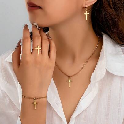 Bộ trang sức 5 món thiết kế hình thánh giá cổ điển thanh lịch, cá nhân hóa, gồm dây chuyền, vòng tay, nhẫn và bông tai, phù hợp cho phụ nữ đeo hàng ngày.