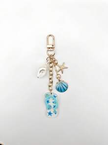 1个航海主题海星贝壳钥匙扣，细节精致，可爱女性配饰，适合海滩度假、日常佩戴，时尚潮流，深受年轻人喜爱。 - 彩色 - 查看 12