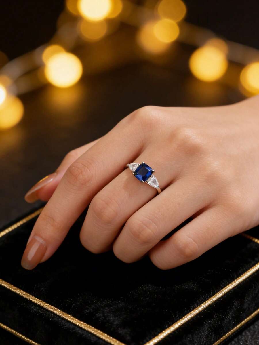 1 chiếc nhẫn bạc 925 mạ bạch kim sang trọng đính đá Zirconia xanh dương, điểm nhấn kim cương hình giọt nước ở hai bên, món quà cao cấp thanh lịch dành cho người yêu. - Nhiều màu - Xem 1