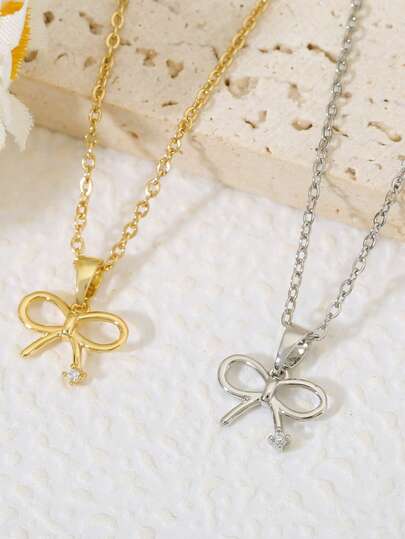 1. Mặt dây chuyền hình nơ đơn giản và thời trang, đính đá Zirconia, nhỏ nhắn và tinh tế, đa năng và phù hợp cho phụ nữ đeo hàng ngày.