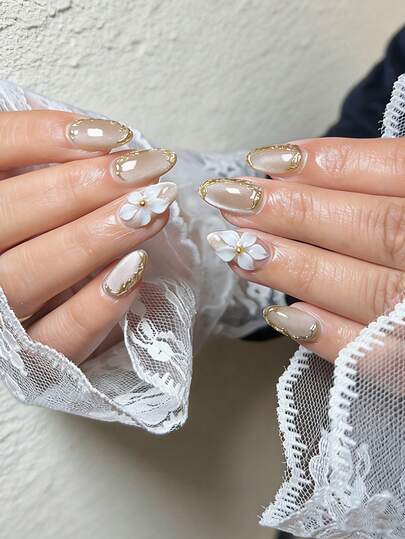 Medium-Sized Almond-Shaped Press-On Nail Stickers, 10-Piece DIY Set. Featuring A Nude Pink Base With A Milk Tea Cat-Eye Design, Accented With 3D Embossed White Flowers And Gold-Plated Edges. These Elegant, Luxurious French-Style Nail Stickers Exude A Gentle, Feminine Charm, Perfect For Women's Daily Commutes, Dates, And Weddings. Removable And Reusable Press-On Nails.