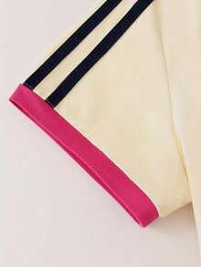 Áo thun nữ kiểu dáng thường ngày phối màu tương phản, sọc bên hông, phong cách sinh viên, thích hợp mặc hàng ngày, áo thun cổ tròn ôm sát, họa tiết chữ tối giản, phối nhiều mảnh vải, phù hợp cho mùa hè. - Màu be - Xem 5