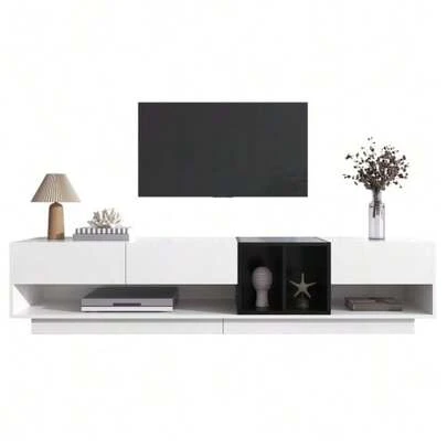 Low TV Unit In Glossy White And Black. Design With Color Blocks, Drawers, Compartments, And Multiple Storage Spaces.