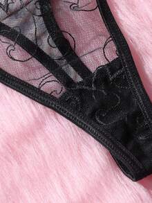 Bộ đồ lót nữ gợi cảm họa tiết da báo gồm áo ngực nâng ngực buộc dây, dây nịt và quần lọt khe. - màu đen - Xem 7