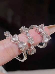 Set de 3 anillos ajustables con forma de lazo y corazón, adecuados para uso diario - corbata de moño - Ver 2