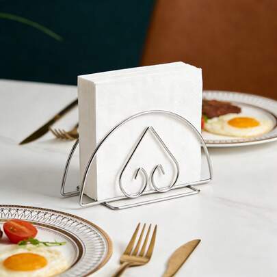 1 hộp đựng khăn ăn hình trái tim bằng thép không gỉ chịu lực cao, kiểu dáng đứng độc lập, chống gỉ và ăn mòn, thích hợp cho nhà bếp, phòng ăn, phòng tắm để đựng khăn ăn, lý tưởng cho nhà hàng, quán cà phê, khách sạn và sử dụng hàng ngày, những dịp lãng mạn. Thiết kế mở giúp dễ dàng lấy khăn ăn, đế vững chắc đảm bảo sự ổn định, dễ lau chùi, giải pháp lưu trữ gọn gàng và lãng mạn cần thiết cho bàn ăn.