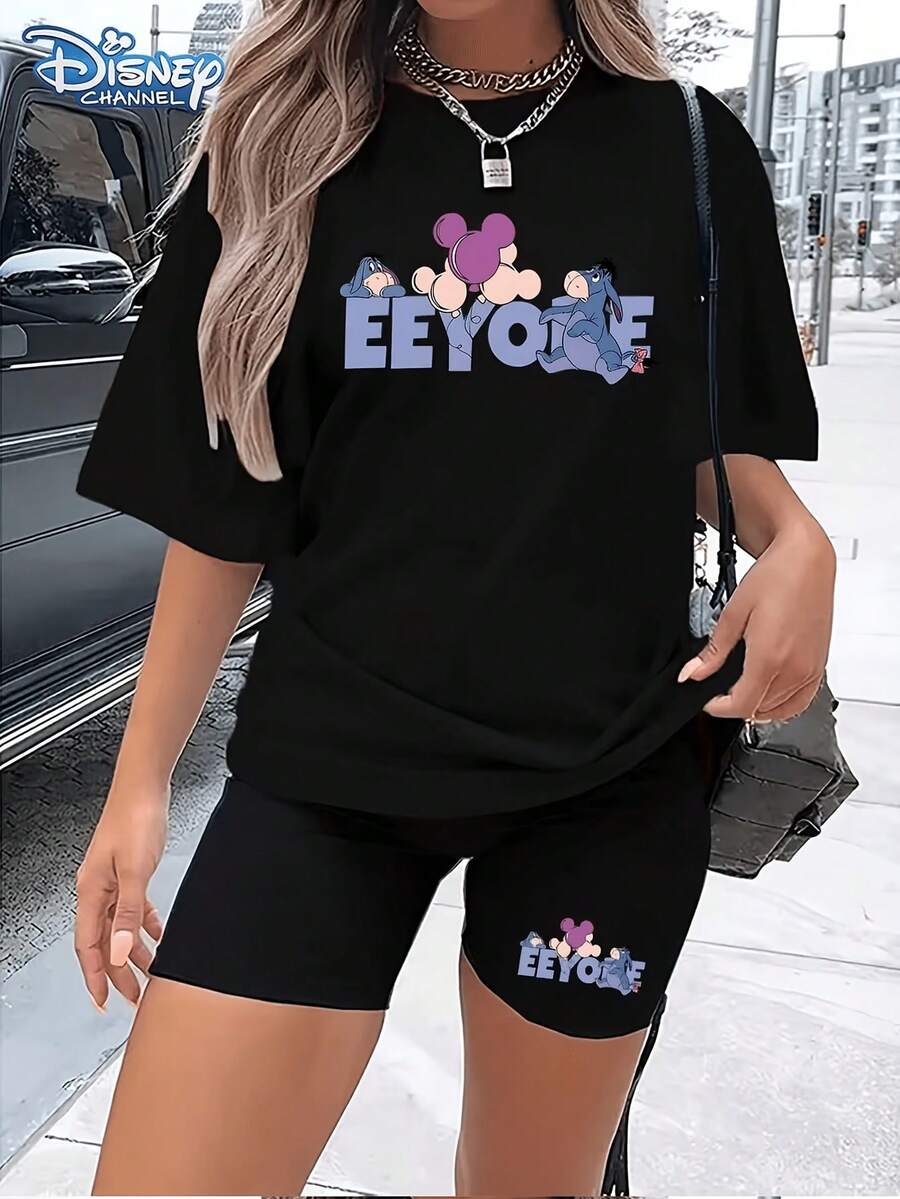 [Disney Licensed]Disney Women's Black Short Sleeve T-Shirt With Eeyorethe Donkey Cartoon Print, Eeyorewith Shy Expression, Two Colorful Balloons With Mickey Mouse Profile Floating Above, "EEYOY" Text Repeated Twice Above, Women's Summer Short-Sleeve T-Shirt And Shorts Set, Made From 100% Polyester For A Cool, Breathable Feel. Women's Two-Piece Set,Summer Outfits For Women,Disneyoutfits Women,Conjuntos De Dos Piezas Para Mujer, Women's Spring/Summer Printed T-Shirts And Printed Shorts, Festival Outfits, Summer Tops For Women, Ropa De Verano Mujer, Beach Outfits, Holiday T-Shirts, Great Gifts For Friends, Graphic Tee, IP Collaboration Women's Two-Piece Set - 黑色 - 查看 1