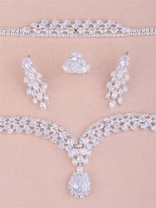 CORUIXI Juego de joyería de 4 piezas de lujo y elegante con zirconia cúbica en forma de lágrima para mujer, que incluye collar, aretes, pulsera y anillo. Collar de gargantilla de cristal y diamante brillante de plata adecuado para novia, dama de honor o regalo de cumpleaños. - Plateado - Ver 5
