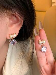 1 Đôi bông tai hình nơ kiểu Pháp thanh lịch và ngọt ngào. Thích hợp để đeo hàng ngày, dự tiệc hoặc các dịp lễ hội, cũng có thể dùng làm quà tặng. - Nhiều màu - Xem 3