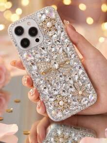 1 Ốp lưng điện thoại sang trọng đính đá 3D mạ điện hình nơ và hoa ngọc trai, thiết kế bao phủ toàn bộ, tương thích với iPhone 17/16/15/13 Pro Max & Galaxy S26/A56 & Redmi 15 – Món quà Ngày của Mẹ thanh lịch dành cho mẹ, quà sinh nhật và kỷ niệm hoàn hảo! - trắng - Xem 1