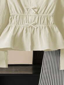 Bộ đồ thể thao cho bé gái gồm áo tay dài cổ chữ V thắt nơ và quần ống đứng kẻ sọc, thích hợp cho mùa xuân/thu. - Màu be - Xem 5