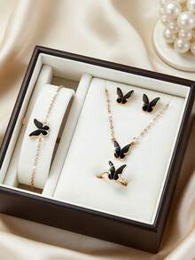 6件套优雅蝴蝶图案女士腕表套装，包括椭圆形罗马数字石英表、蝴蝶手链、耳环和戒指，属于女士配饰系列。 - 黑色 - 查看 8