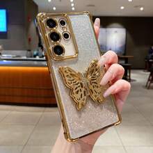 （蝴蝶支架）蝴蝶造型可折叠隐藏支架，可横向或纵向放置于桌面，闪光渐变色，四角气垫防摔透明手机壳，适用于安卓SX A57 A37/57 A123456789987654321 45G系列手机，电镀四角气垫防摔透明手机壳，适用于三星/S26/S25/S24/S23/S22系列/A系列、摩托罗拉、Pixel等手机。 - 金色 - 查看 2