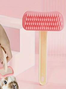 1 chiếc lược chải lông thú cưng bằng silicon với lông mềm mại và đầu hình trái tim - Lược chải gỡ rối nhẹ nhàng, mát-xa cho thú cưng nhỏ như mèo, chó, thỏ, chuột lang giúp giảm rụng lông. - Xem 10