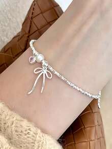 Vòng tay bạc Sterling hình trái tim màu hồng, nơ tình yêu, ngọc trai bạc vỡ, thiết kế đơn giản kiểu Nhật Bản và Hàn Quốc. - Vòng tay nơ bạc - Xem 3