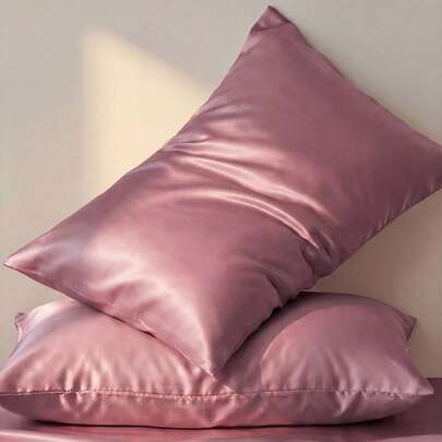 Bộ 2 vỏ gối satin, mềm mại và thoáng khí, chống nhăn, bảo vệ tóc và da, cải thiện chất lượng giấc ngủ. Kiểu đóng mở dạng phong bì, mềm mại như lụa, phù hợp với giường cỡ tiêu chuẩn (lớn, cực lớn, giường đơn).