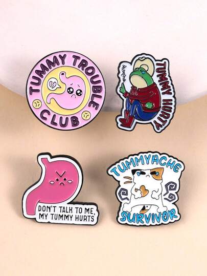 Bộ ghim cài áo tráng men chủ đề về các vấn đề khó chịu đường tiêu hóa, bao gồm hình ảnh dạ dày khó chịu, đau bụng, mèo và ếch denim. Ghim cài áo kiểu dáng hình người dễ thương, phù hợp để cài lên quần áo, ba lô, lý tưởng cho những người có dạ dày nhạy cảm và những người yêu thích việc tự chữa lành một cách hài hước.
