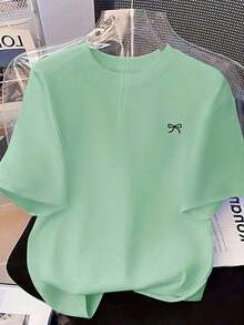 Envío gratis, entrega local enéxico, entrega en 4 días.Camiseta de manga corta con estampado de lazo, corte holgado, para primavera/verano, ropa casual. - verde menta - Ver 1