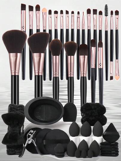 51件套化妆工具套装，包含：24支化妆刷套装+1个发圈+2个化妆刷清洁工具+2个手碗挂绳+6个三角粉扑+6个化妆海绵+3个迷你化妆海绵+3个迷你气垫粉扑+3个圆形粉扑+1个睫毛夹，多功能套装，新手友好 | 方便携带，送礼佳品 | 新手/女性的完美之选