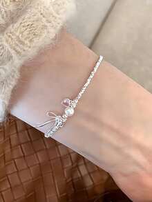 Vòng tay bạc Sterling hình trái tim màu hồng, nơ tình yêu, ngọc trai bạc vỡ, thiết kế đơn giản kiểu Nhật Bản và Hàn Quốc. - Vòng tay nơ bạc - Xem 6