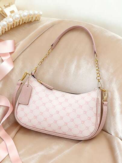 Deze modieuze, klassieke en veelzijdige schoudertas/armtas in halvemaanvorm met letterdesign is gemaakt van effen, waterdicht PU-materiaal en is geschikt om mee te winkelen en kan ook crossbody gedragen worden. (Roze)