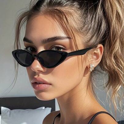 一副黑色小猫眼眼镜，时尚休闲复古风，适合外出、运动、海滩、节日、旅行、街头风、度假、驾驶、钓鱼、户外活动等场合。