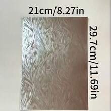 12张A4尺寸银色羽毛激光全息艺术纸 - 银色全息纹理卡纸，带有金属光泽的羽毛图案，适用于婚礼请柬、节日贺卡、DIY礼品盒、手工相册、派对装饰、优雅的手工艺设计，高品质手工纸，创意爱好者的必备之选。 - 12張羽毛卡紙 - 查看 3