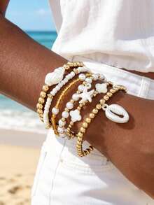 imoli Set de 6 piezas de pulseras de estilo bohemio con cuentas de vidrio, perlas de resina, trébol, estrella de mar y conchas, ideal para mujeres en vacaciones de playa, fiestas y como regalo de joyería - 31285-ank-blanco-EP - Ver 2