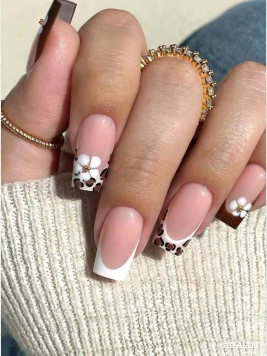 Bộ 10 miếng dán móng tay thủ công màu hồng nude họa tiết da báo và hoa trắng (XS/S/M/L): Nền hồng nude với họa tiết da báo màu nâu đậm, đầu móng kiểu Pháp màu trắng và trang trí hoa trắng 3D, phong cách trung tính ngọt ngào, bề mặt bóng mịn, phù hợp cho các hoạt động hàng ngày, các dịp xã giao nhẹ nhàng, có thể tái sử dụng. - Màu nâu Sô-cô-la - Xem 1