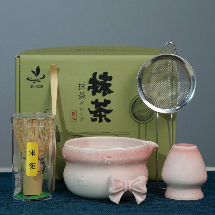粉色陶瓷抹茶茶具套装，包含抹茶筅、抹茶碗、抹茶勺和茶架，适合抹茶爱好者和初学者。 - 彩色 - 查看 1