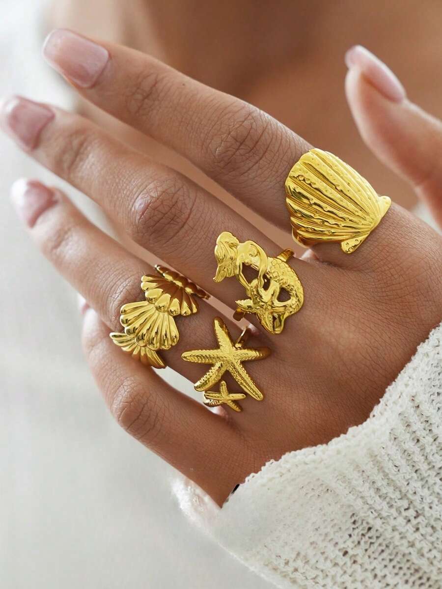 Uself Set de 4 anillos de acero inoxidable 304 chapados en oro de 18K con estilo oceánico, con textura de concha de sirena y estrella de mar, regalo para fiestas en la playa y vacaciones para mujeres