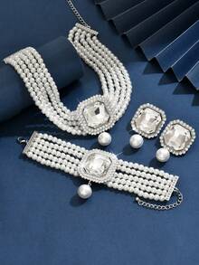 Bộ 4 món sang trọng, cầu kỳ, nhiều lớp đính ngọc trai giả, đá rhinestone và pha lê, gồm vòng cổ, bông tai và vòng tay, thích hợp làm quà tặng cho phụ nữ trong đám cưới, tiệc tùng và các dịp lễ. - Nhiều màu - Xem 4