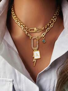 1 pieza Collar con colgante de tono dorado para mujer, con 26 etiquetas con letras, llavero, anillos ovalados con rhinestones, colgante en forma de lágrima azul y colgante en forma de rayo. Su diseño poderoso y estilo elegante muestran un estilo personalizado, adecuado para uso diario y también un gran regalo. - Dorado - Ver 1