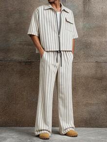 Bộ đồ nam thường ngày gồm áo sơ mi ngắn tay có khóa kéo và quần dài kẻ sọc. - Nhiều màu - Xem 4