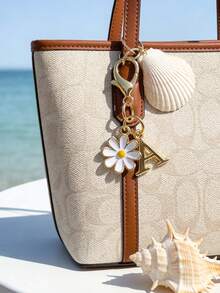 1个个性化雏菊字母A-Z钥匙扣，可定制姓名，带花朵吊坠，可爱字母钥匙扣挂饰，男女老少皆宜，耐用金属钥匙圈，可用于车钥匙、背包、手提包和钱包，优雅的花朵字母配饰，适合日常使用、上学、旅行，是送给妈妈、爸爸、老师、朋友的完美礼物，适合生日、毕业典礼、婚礼、友谊日、情人节、圣诞节等场合。 - 彩色 - 查看 4